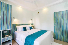 Captivating Tree and Garden Views One Bedroom Apartment with AC,wifi, Gym and 5min walk to beach